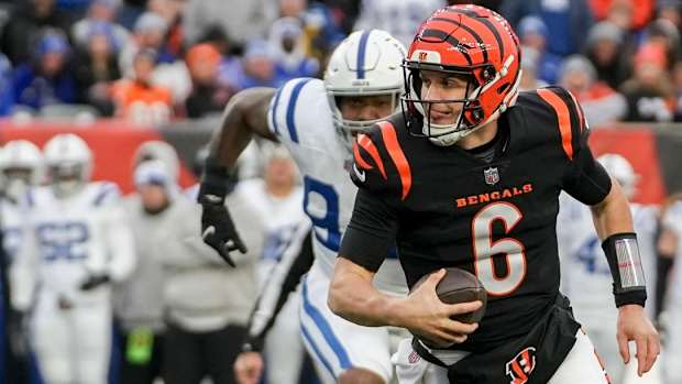 Jake Browning scrambles against the Indianapolis Colts in his second NFL start.